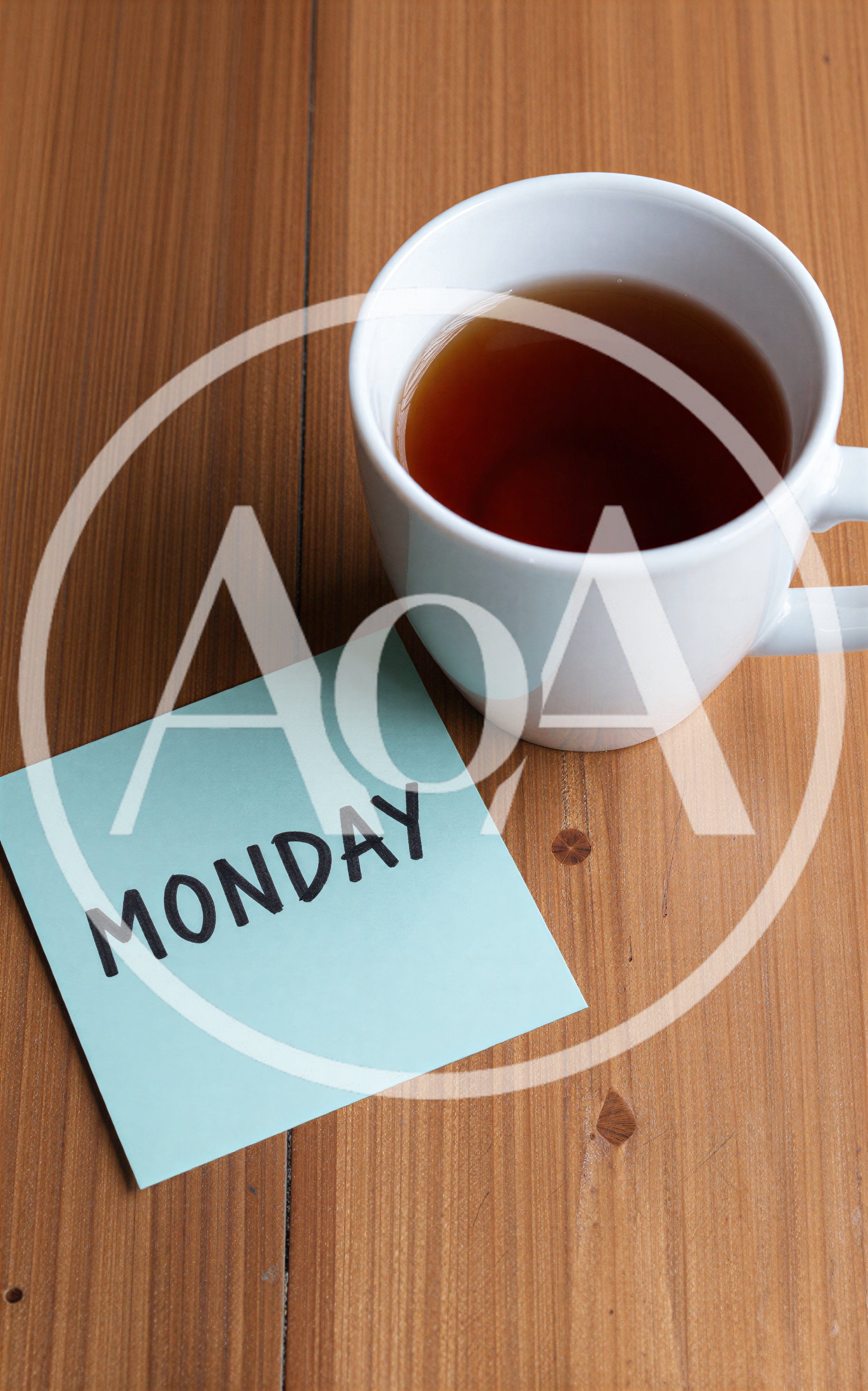 Monday Note On Wooden Table With Coffee Cup