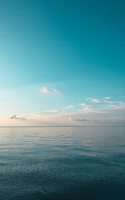 Calm Ocean Horizon Under A Clear Blue Sky
