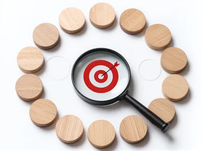 Magnifying Glass Focusing On A Red Target Symbol