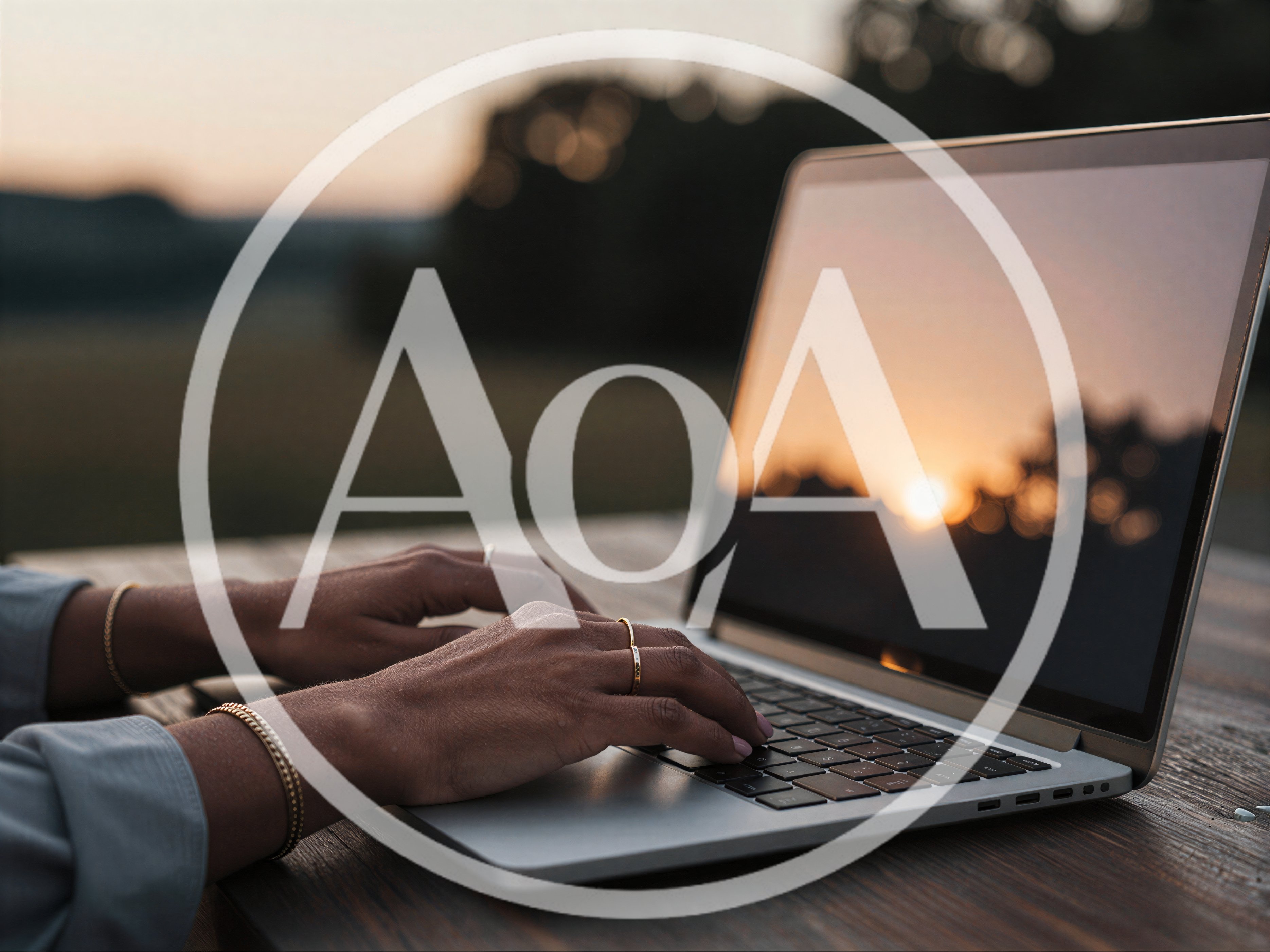 Woman Typing On Laptop Outdoors At Sunset