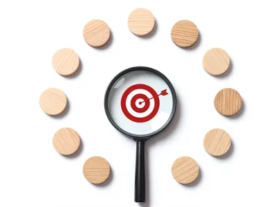 Magnifying Glass Focusing On A Red Target Icon