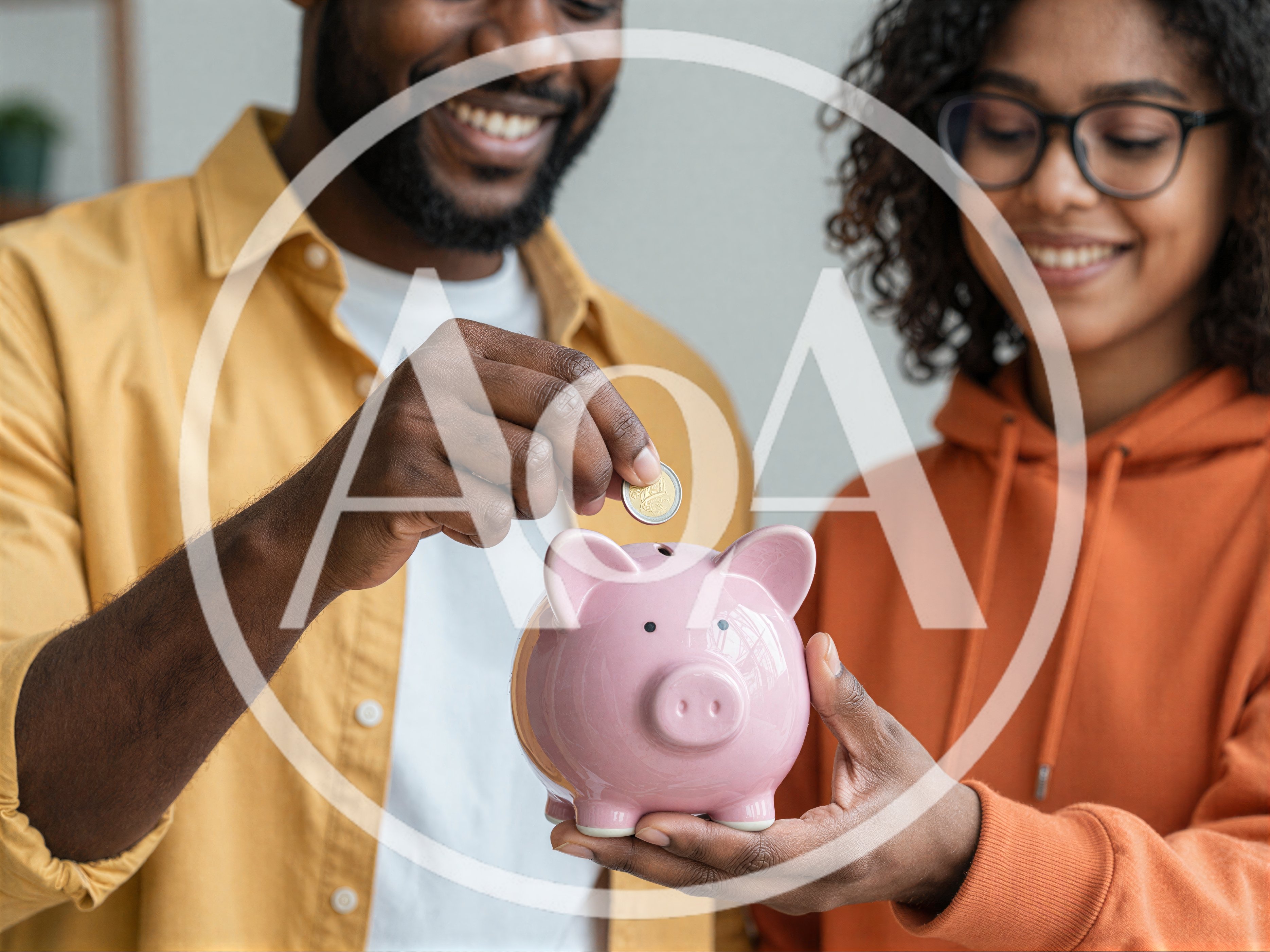 Happy Couple Saving Money In A Piggy Bank