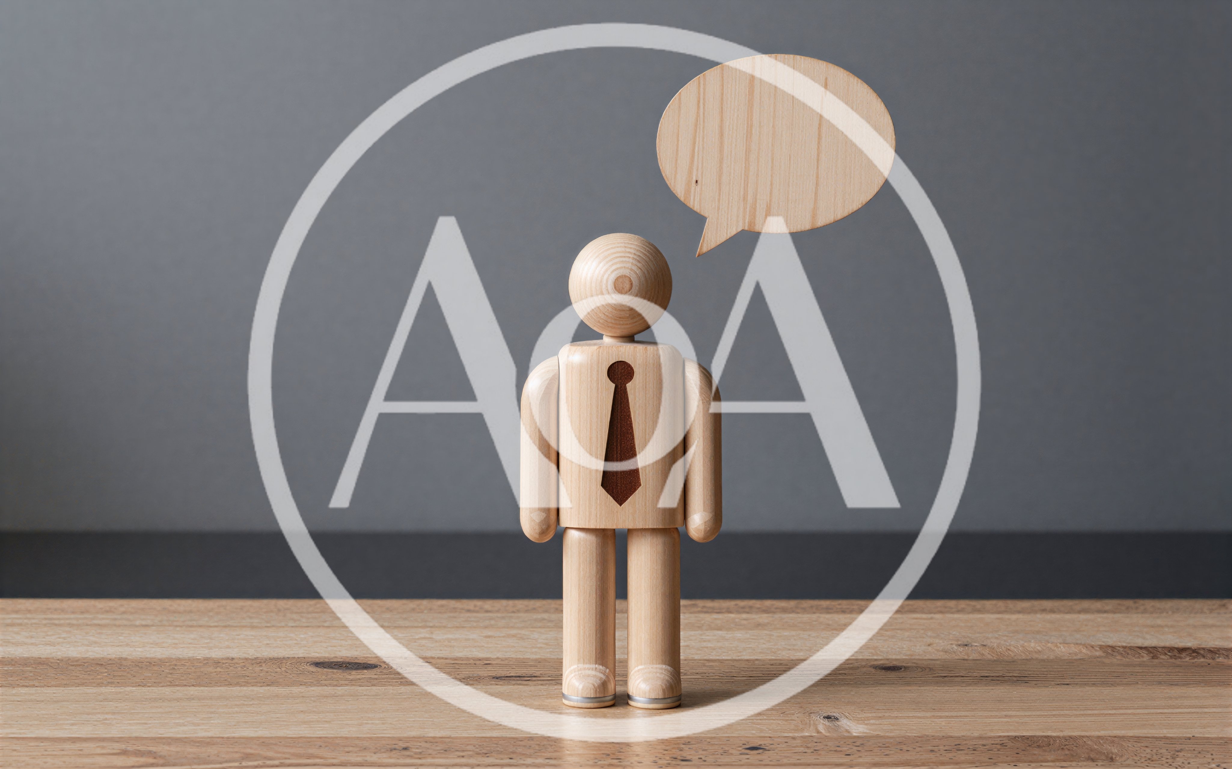 Wooden Mannequin Figure With Speech Bubble On Table