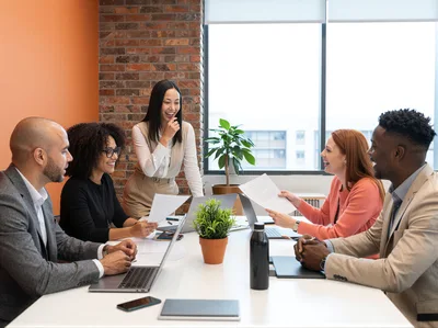 Diverse Business Team Collaborating in Modern Office Meeting