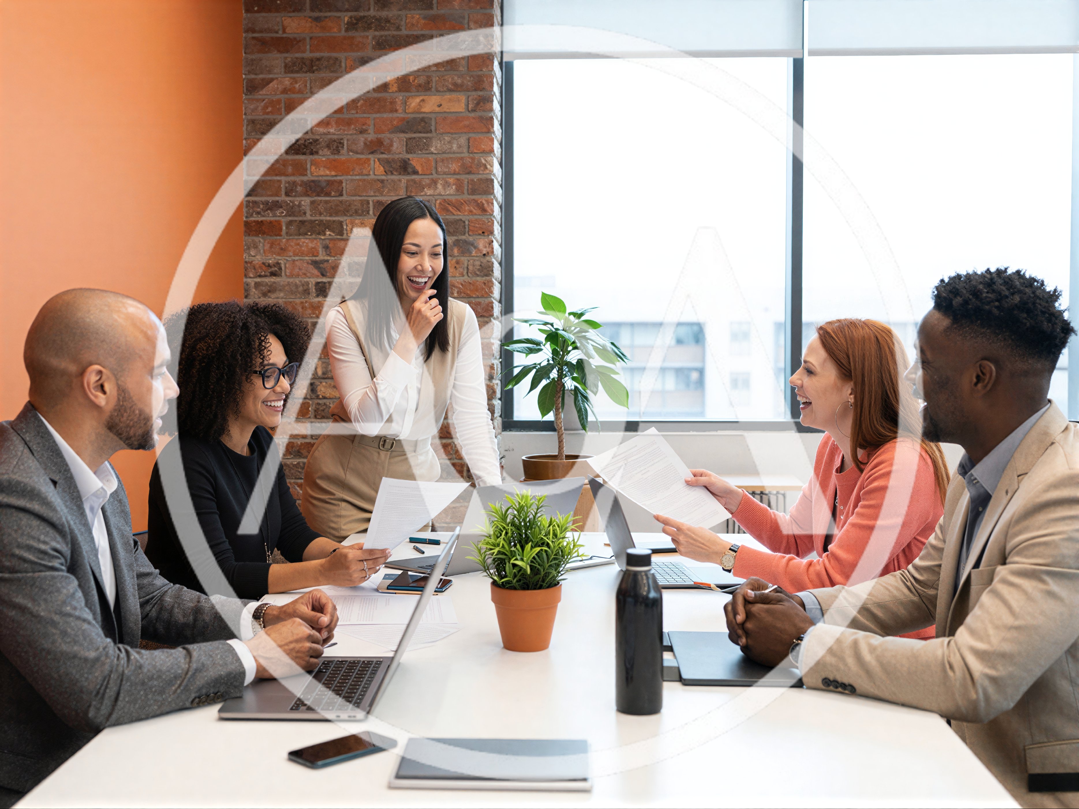 Diverse Business Team Collaborating in Modern Office Meeting