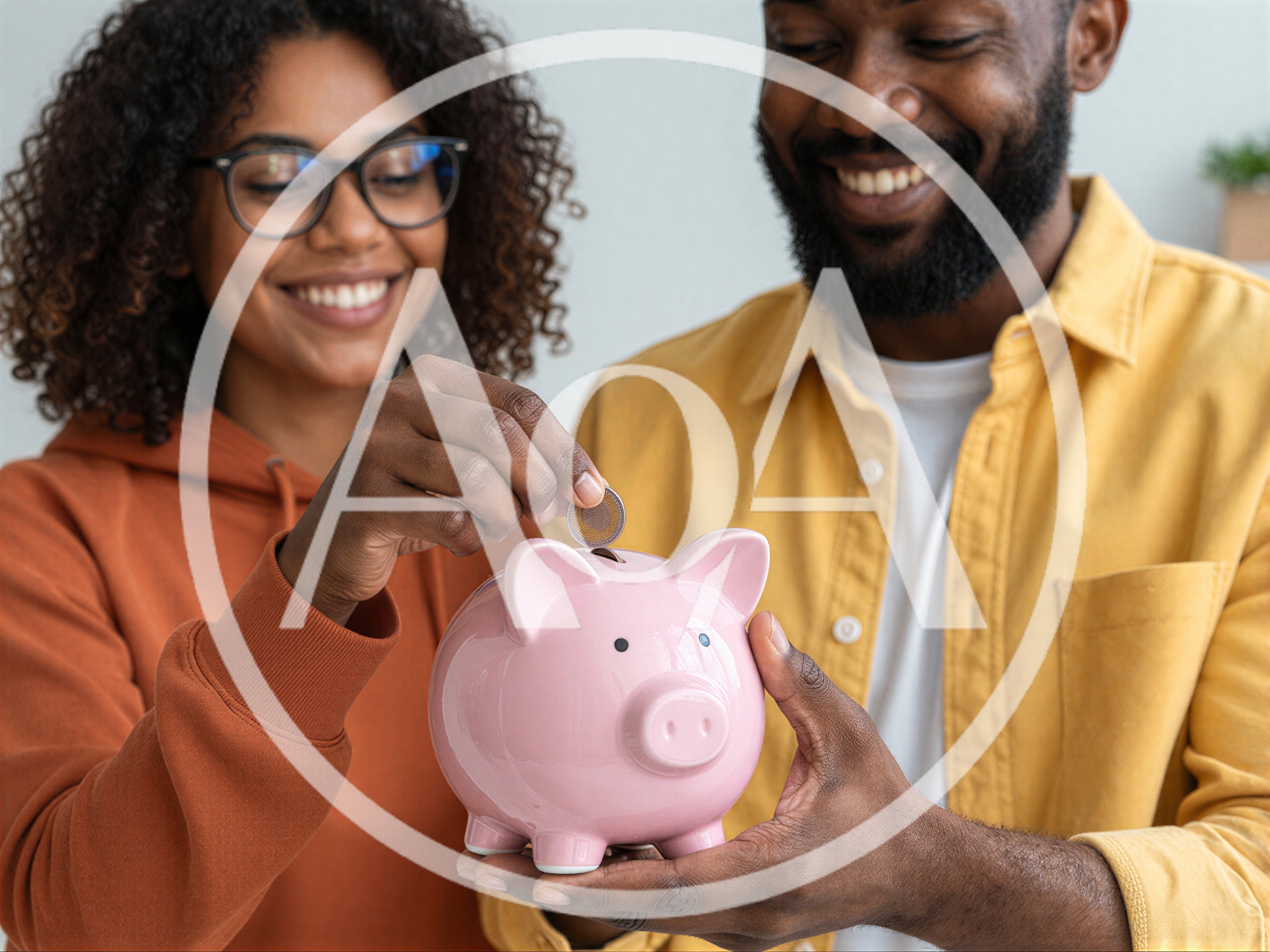 Happy Couple Saving Money In A Piggy Bank