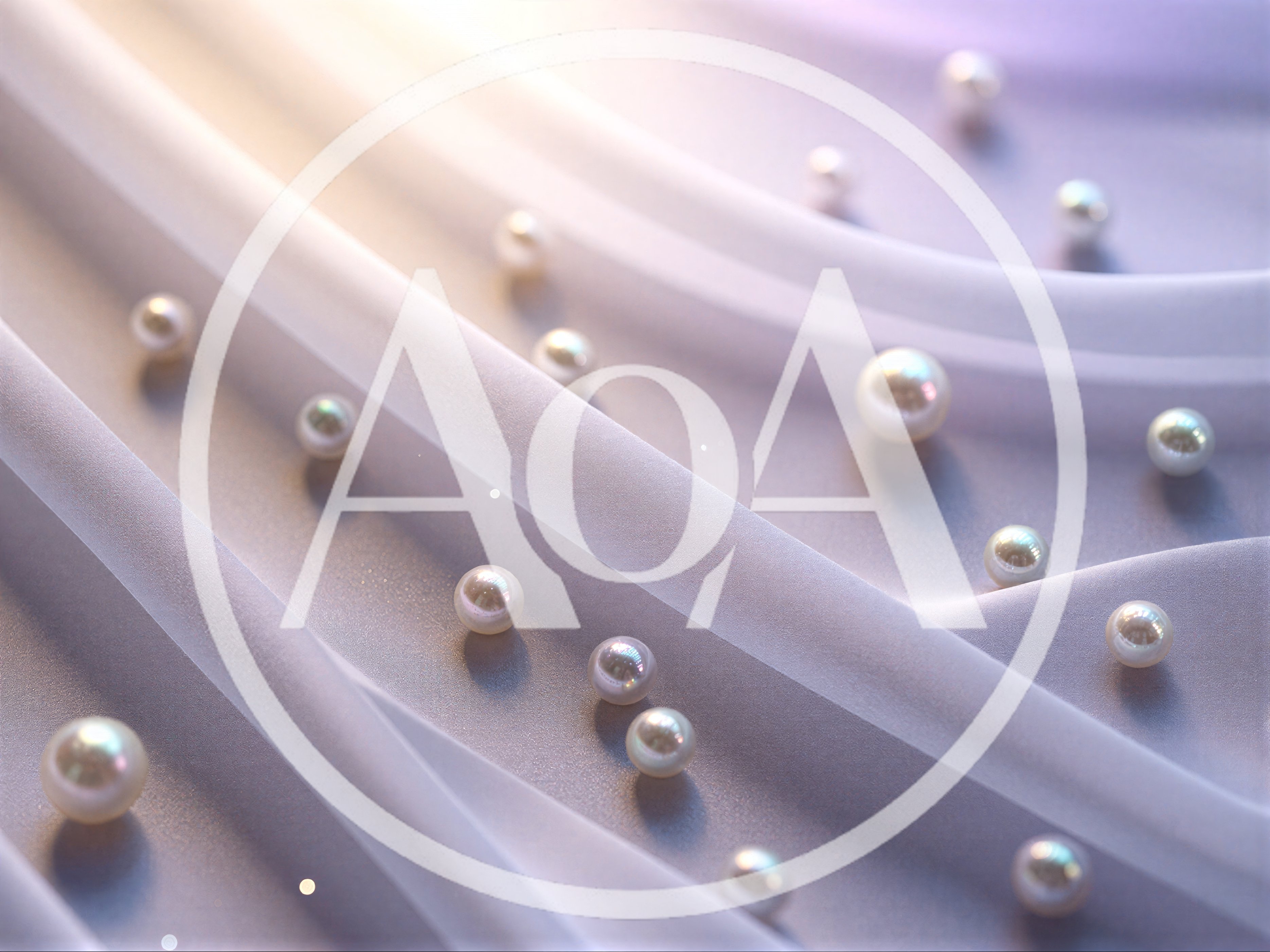 Elegant White Pearls Scattered On Soft Flowing Fabric