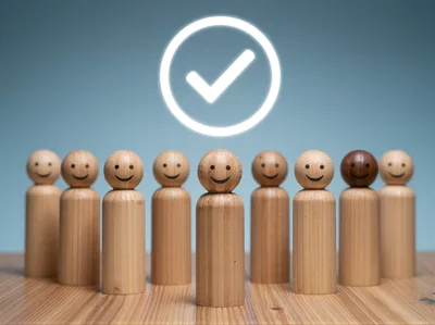 Wooden Peg Dolls Standing In A Row