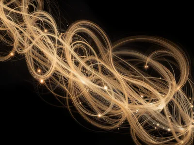 Abstract Golden Light Trails On Black Background