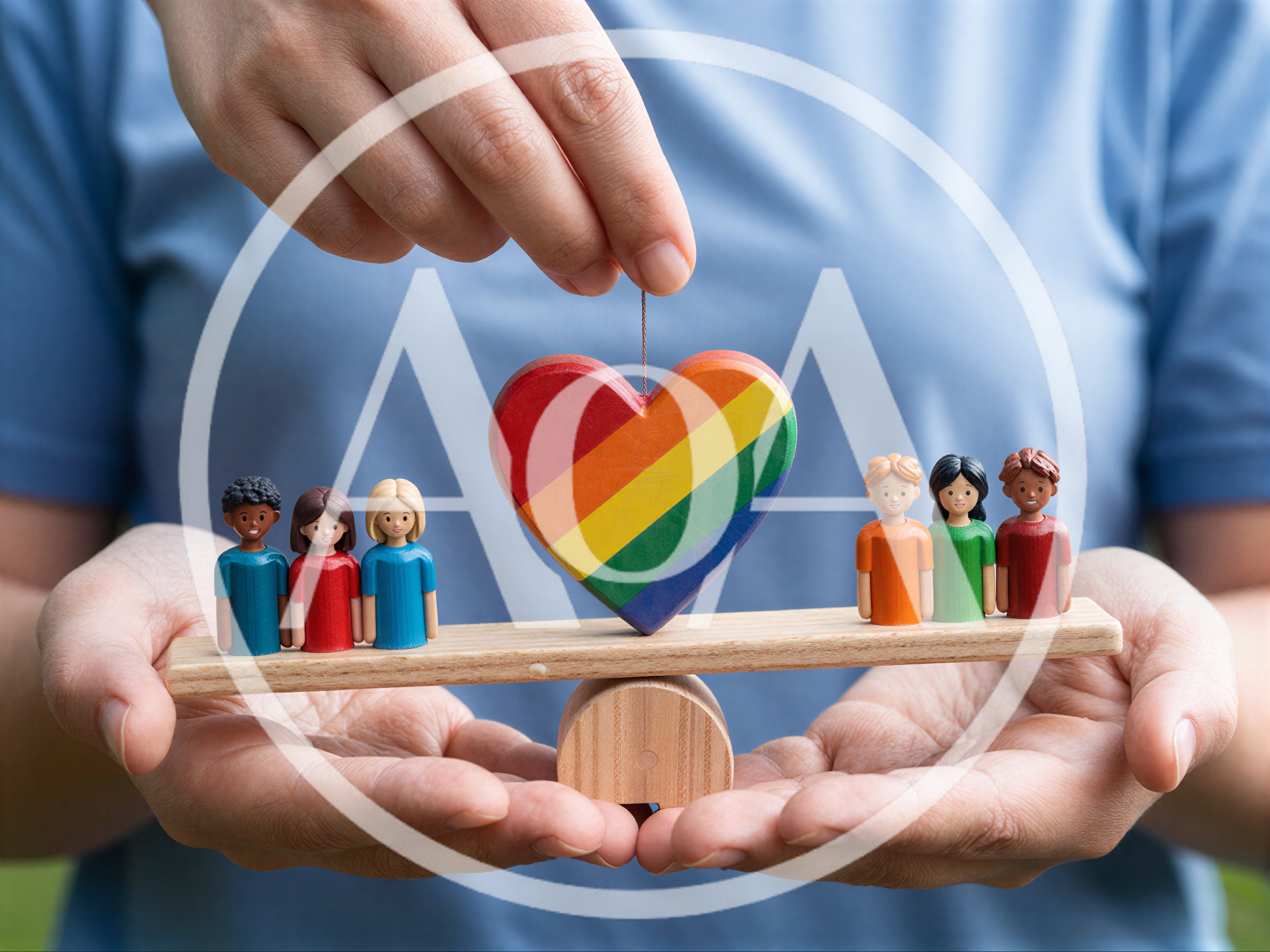 Hands Holding Wooden Scale With Rainbow Heart And Figurines