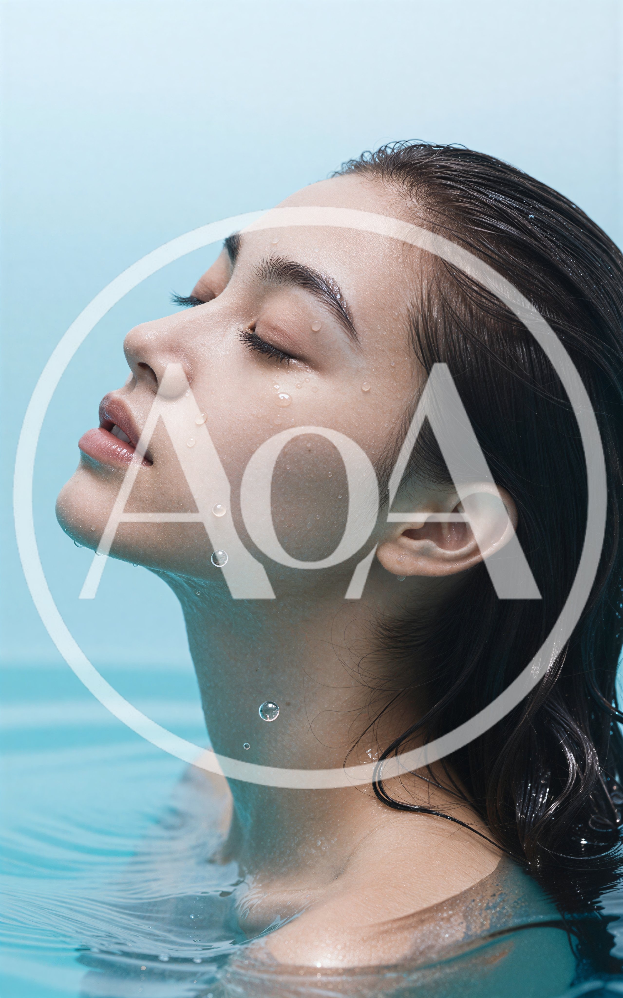 Young Woman Relaxing In Water With Wet Skin