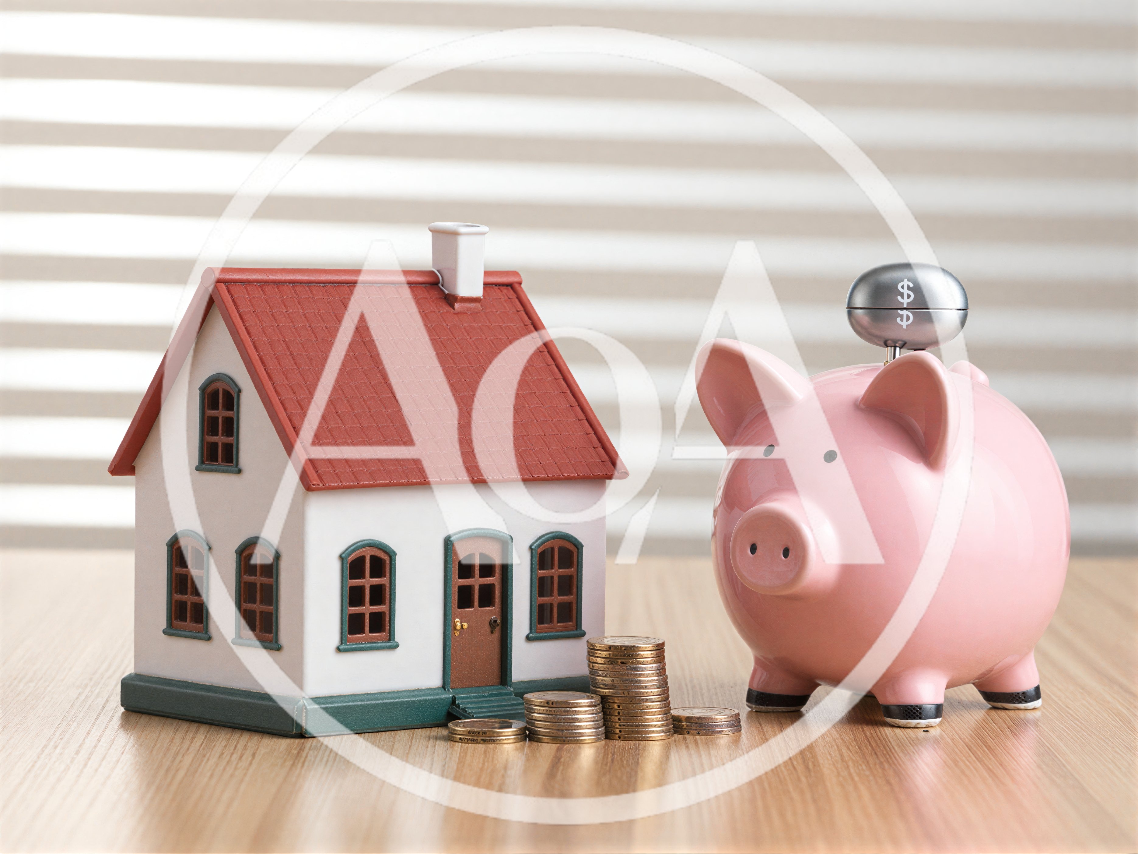 Model House and Piggy Bank with Stacked Coins