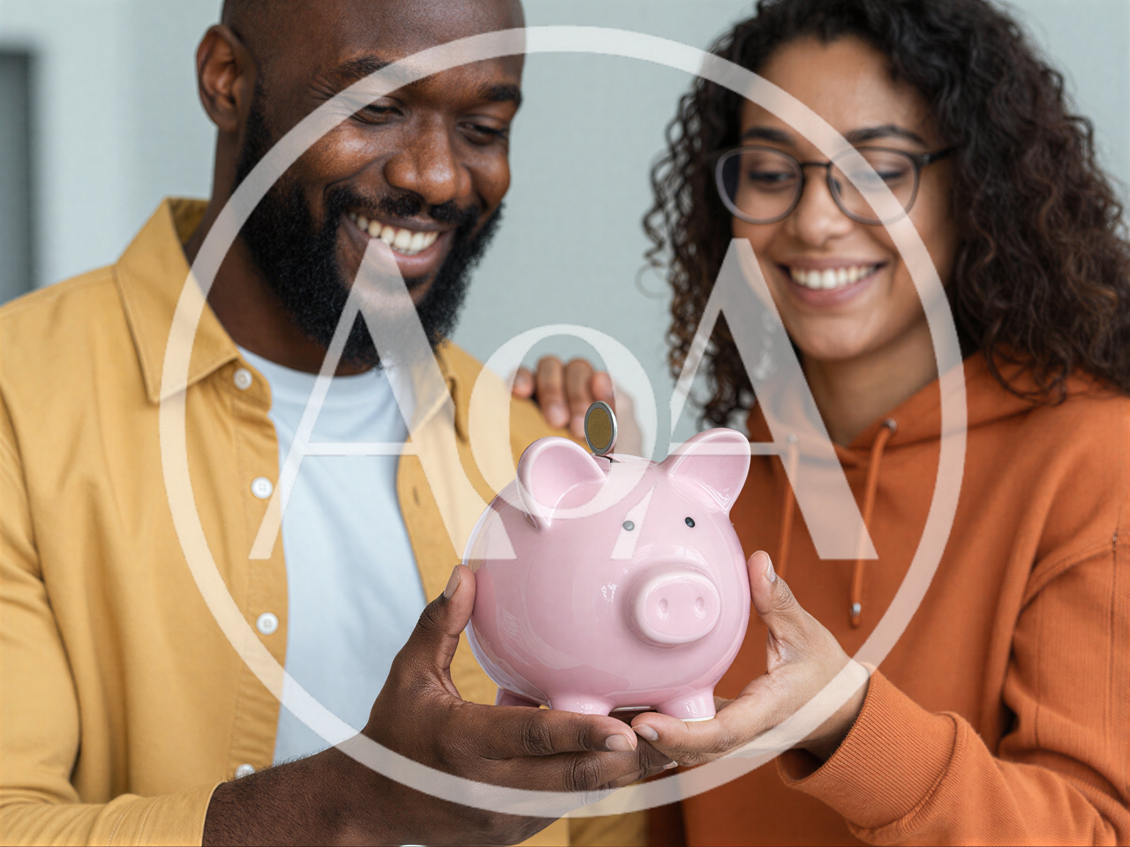 Happy Couple Holding A Pink Piggy Bank