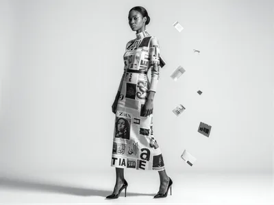 Fashion Model Wearing Newspaper Print Dress