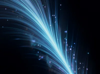 Abstract Blue Light Streaks And Glowing Particles