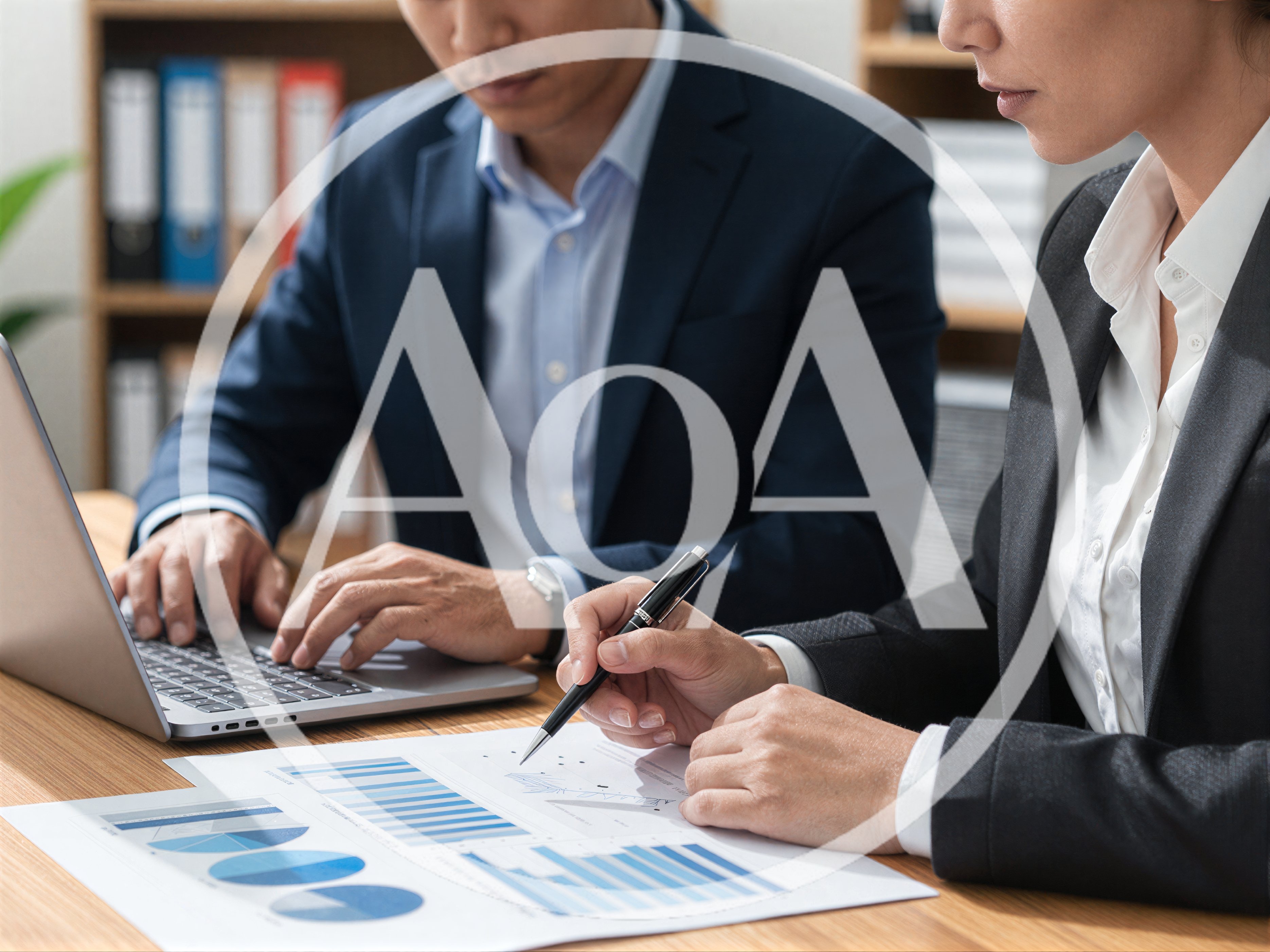 Business Professionals Analyzing Financial Charts In Office
