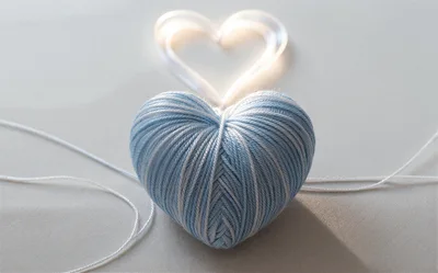 Blue Yarn Heart Shape With Glowing Light Heart