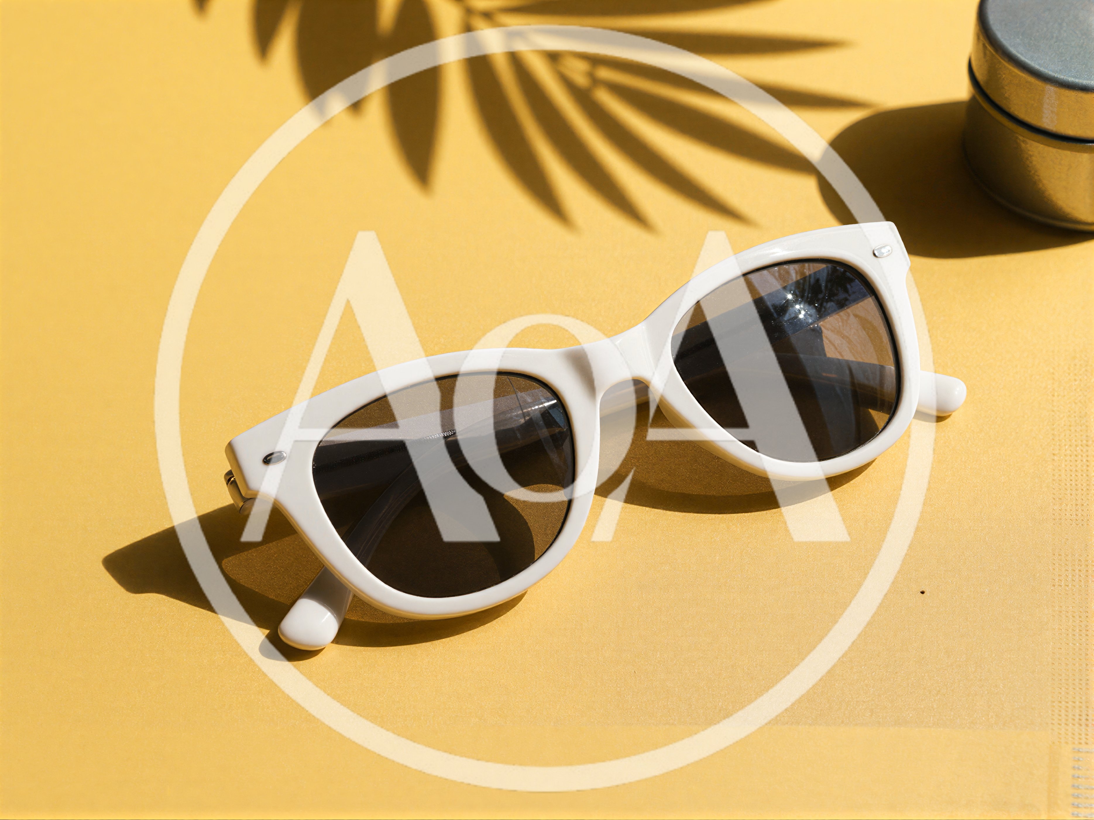 White Sunglasses On A Yellow Background