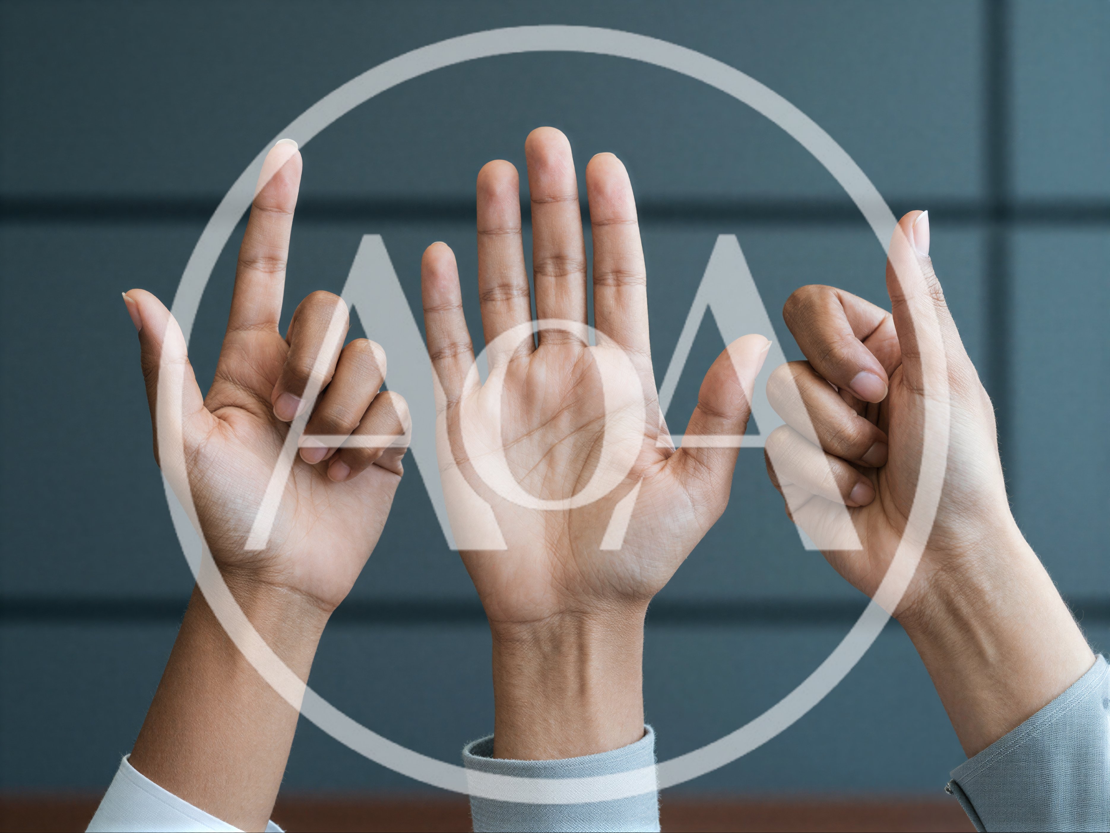 Three Hands Making Different Gestures Against Dark Background