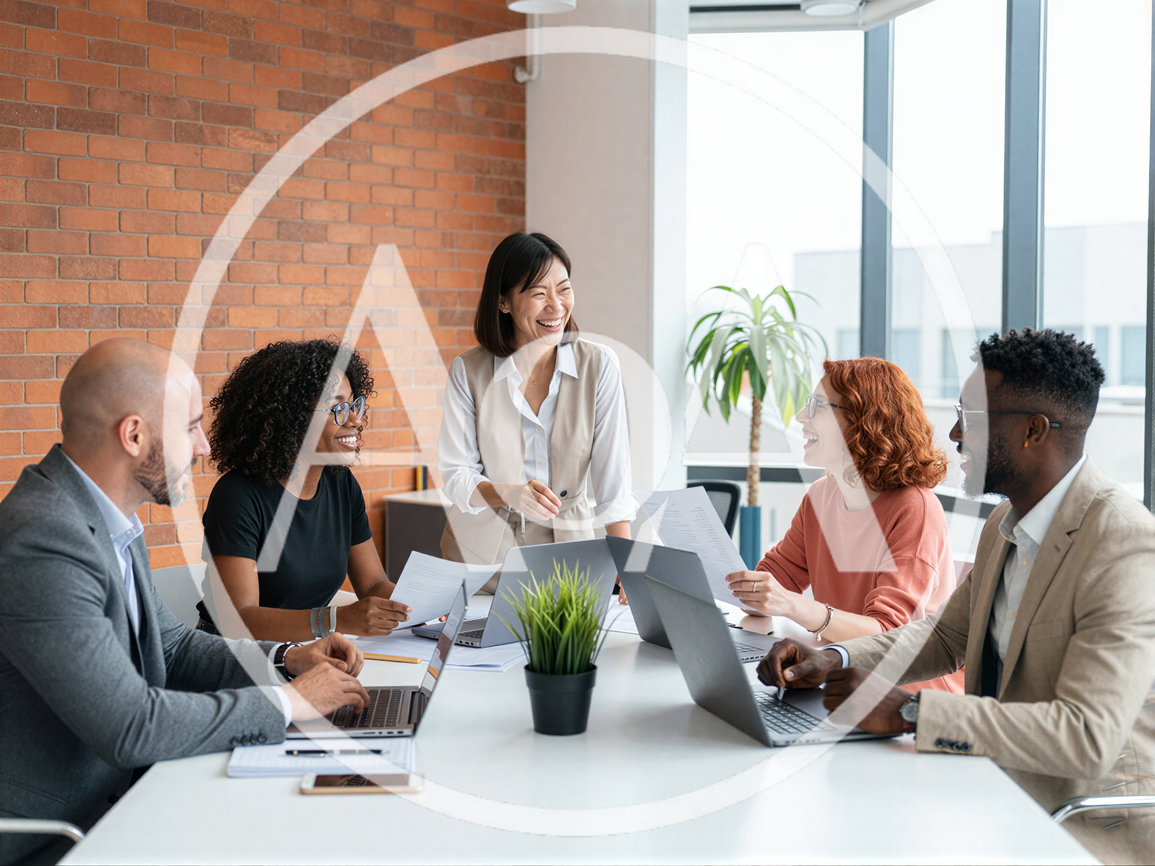 Diverse Professional Team Collaborating During Office Meeting