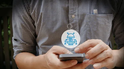 Person Using Smartphone With AI Robot Icon Animation