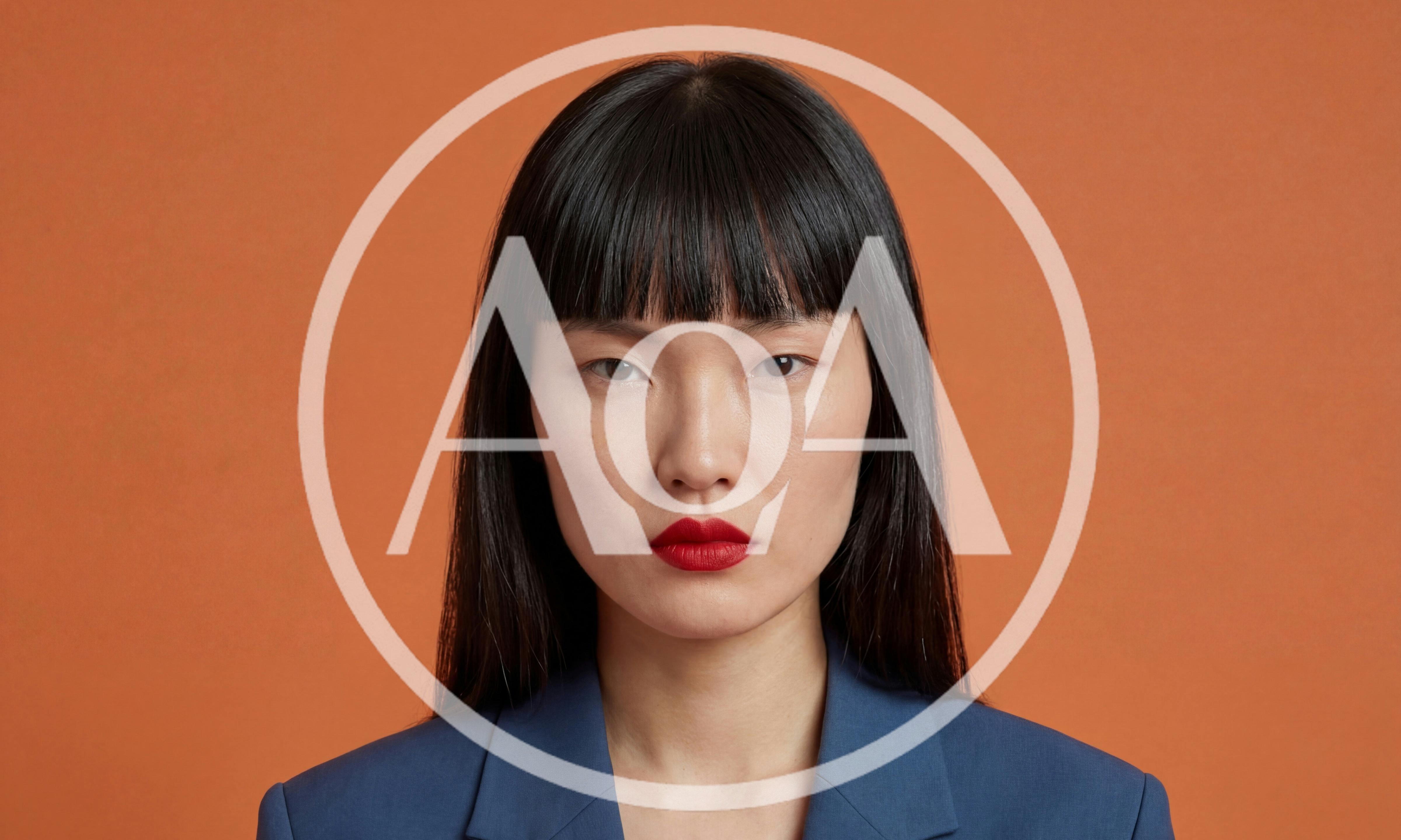 Portrait Of A Professional Asian Woman In A Blue Blazer