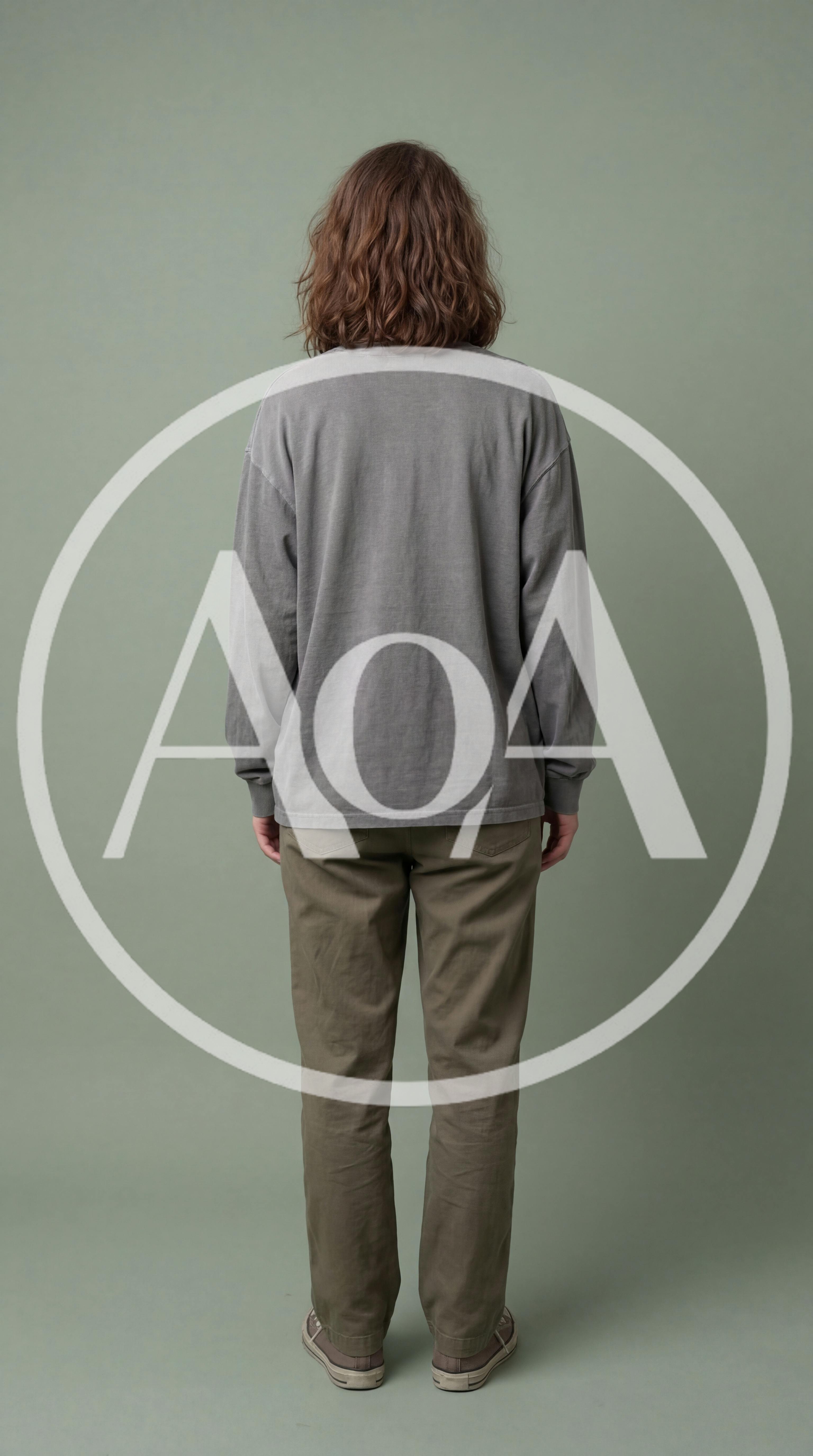 Person Standing Facing Away In Casual Clothing