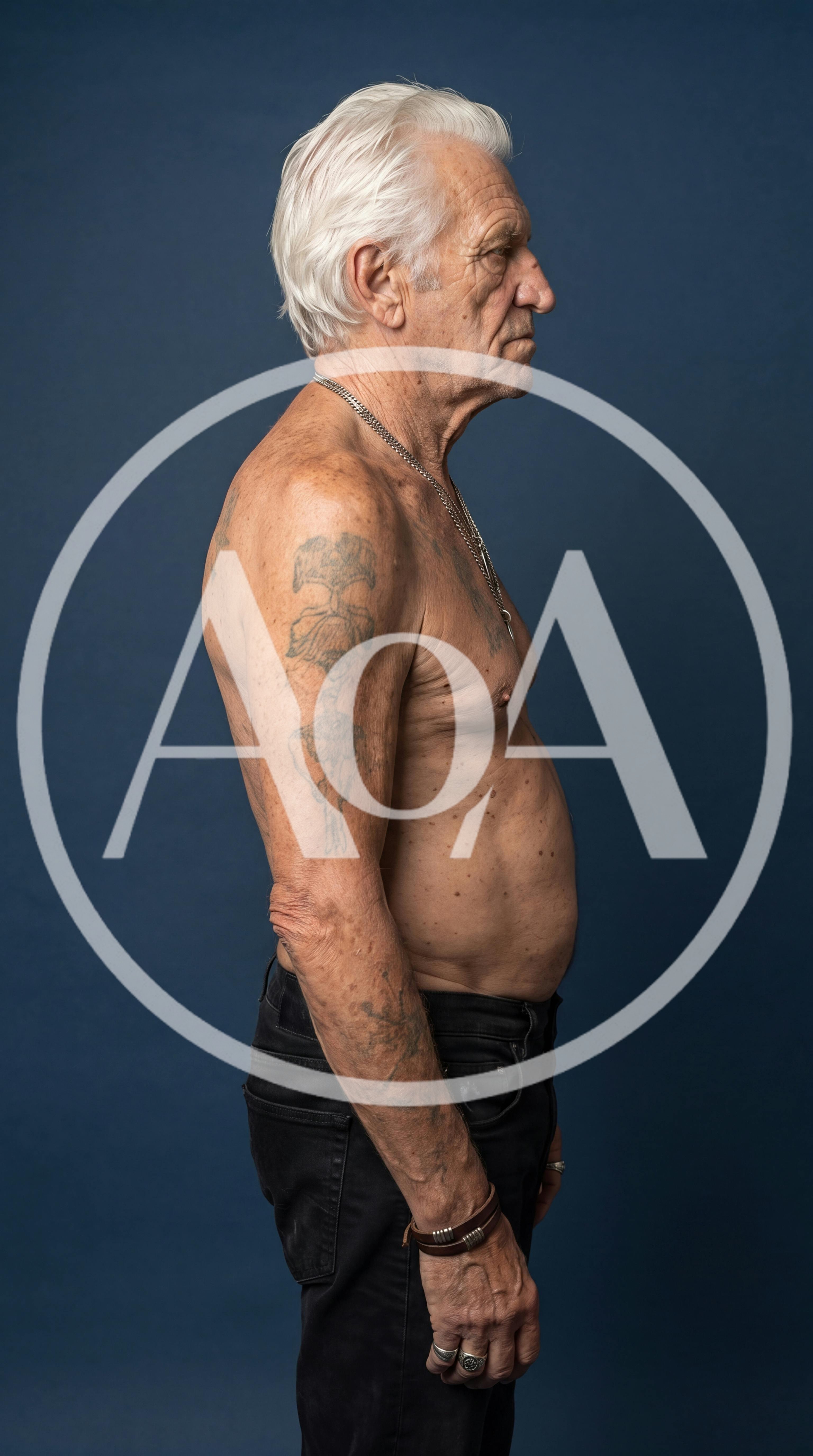 Profile Portrait Of An Older Man With Tattoos