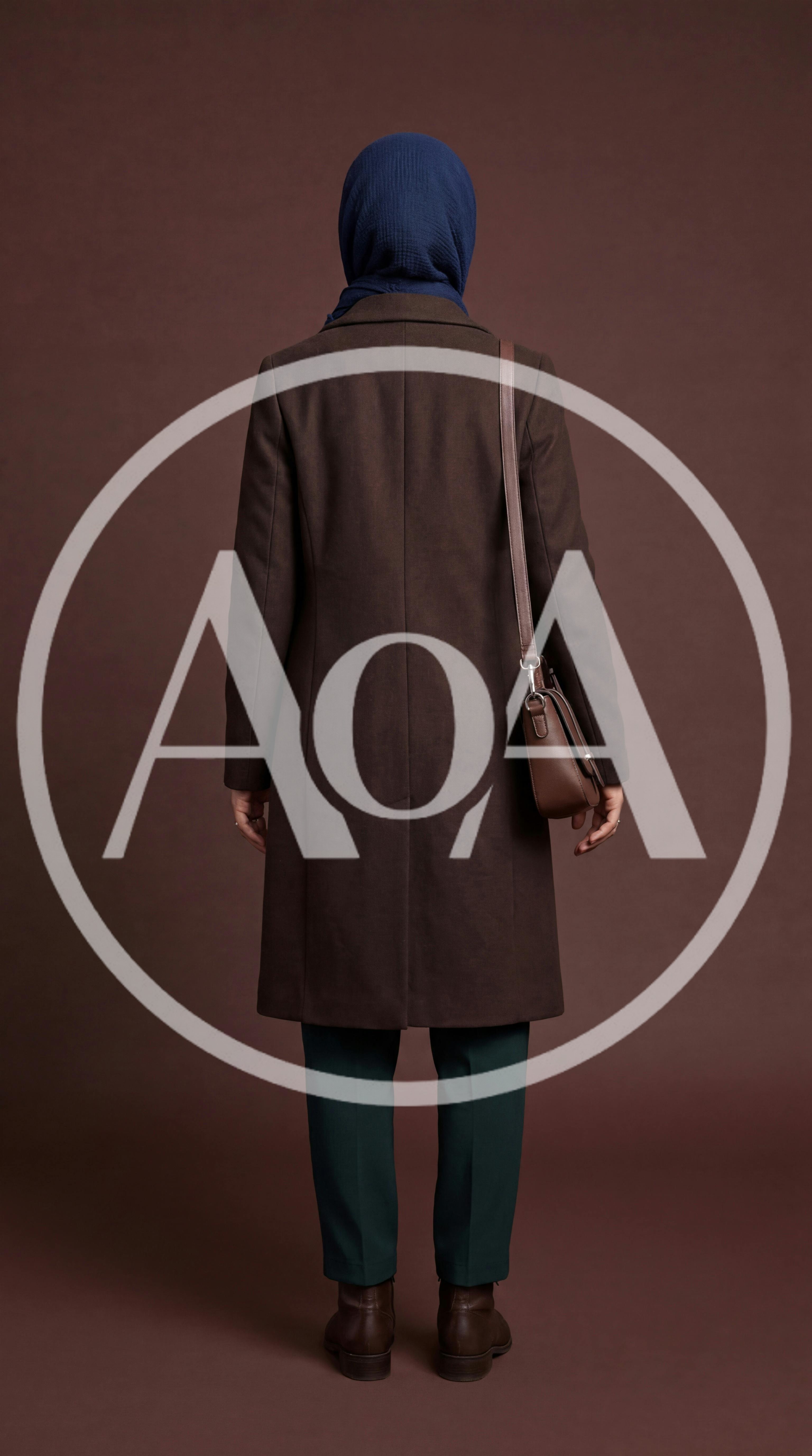 Woman Wearing Hijab and Brown Coat Standing Backwards
