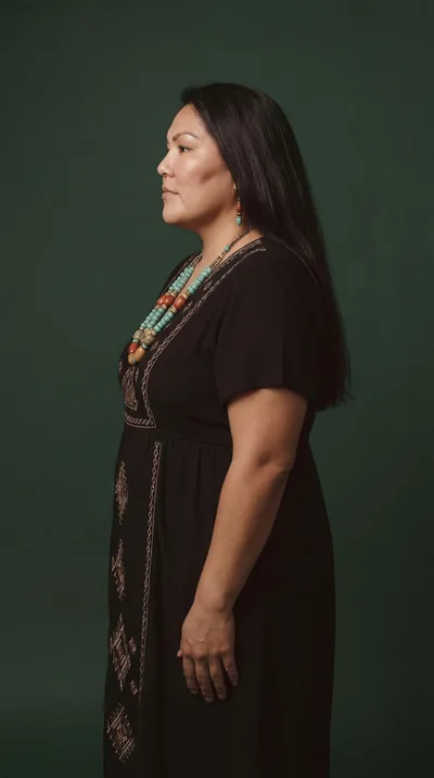 Indigenous Woman Wearing Traditional Jewelry And Embroidered Dress