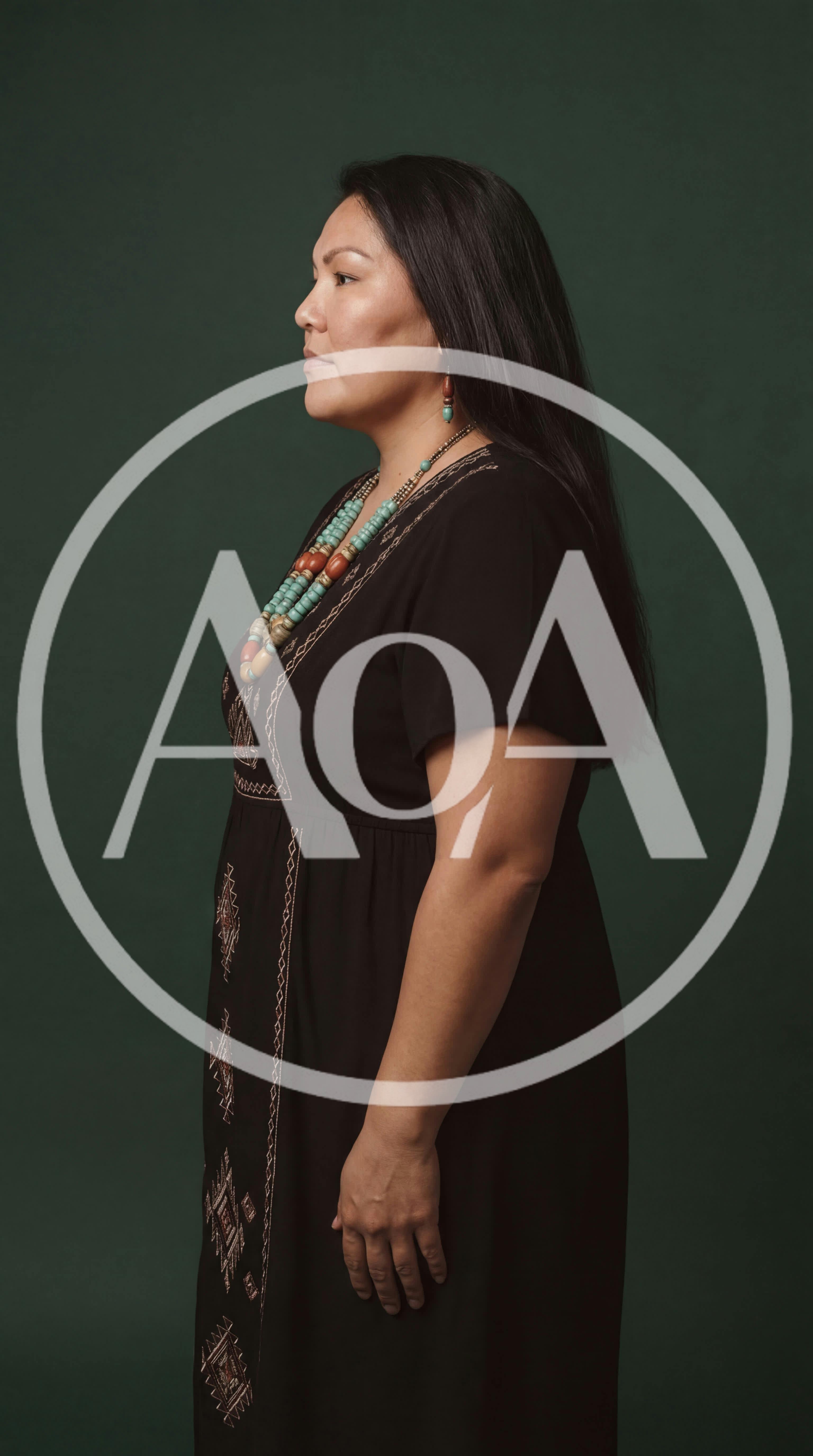 Indigenous Woman Wearing Traditional Jewelry And Embroidered Dress