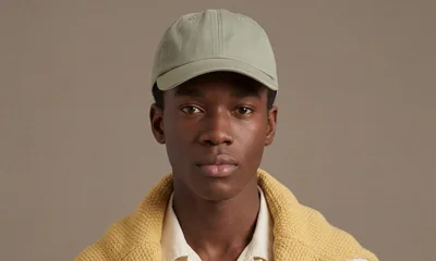 Portrait Of A Young Man Wearing A Baseball Cap