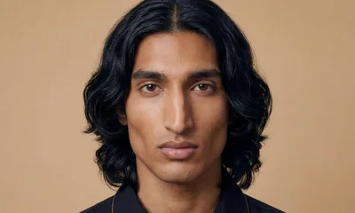 Portrait Of A Young Man With Long Dark Hair