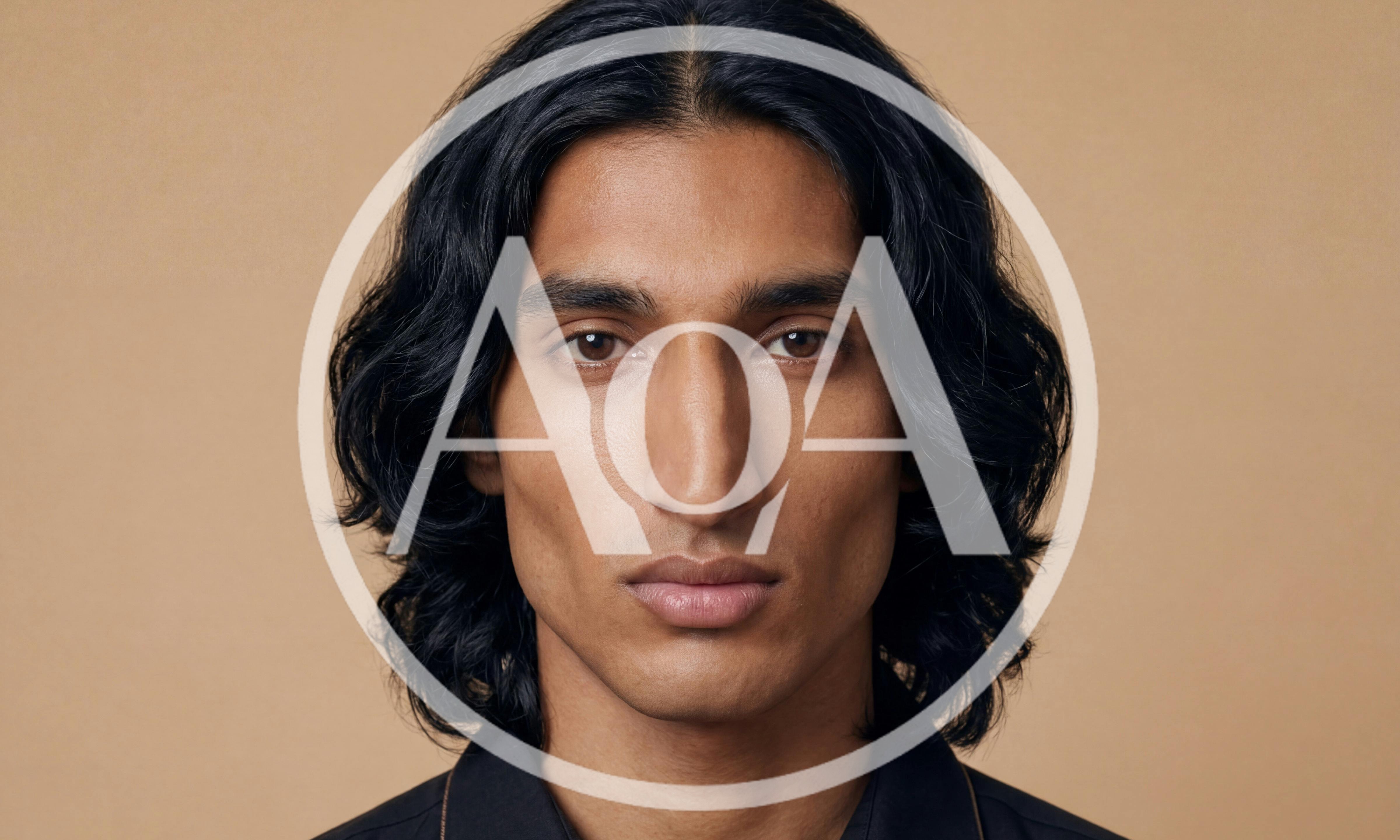 Portrait Of A Young Man With Long Dark Hair