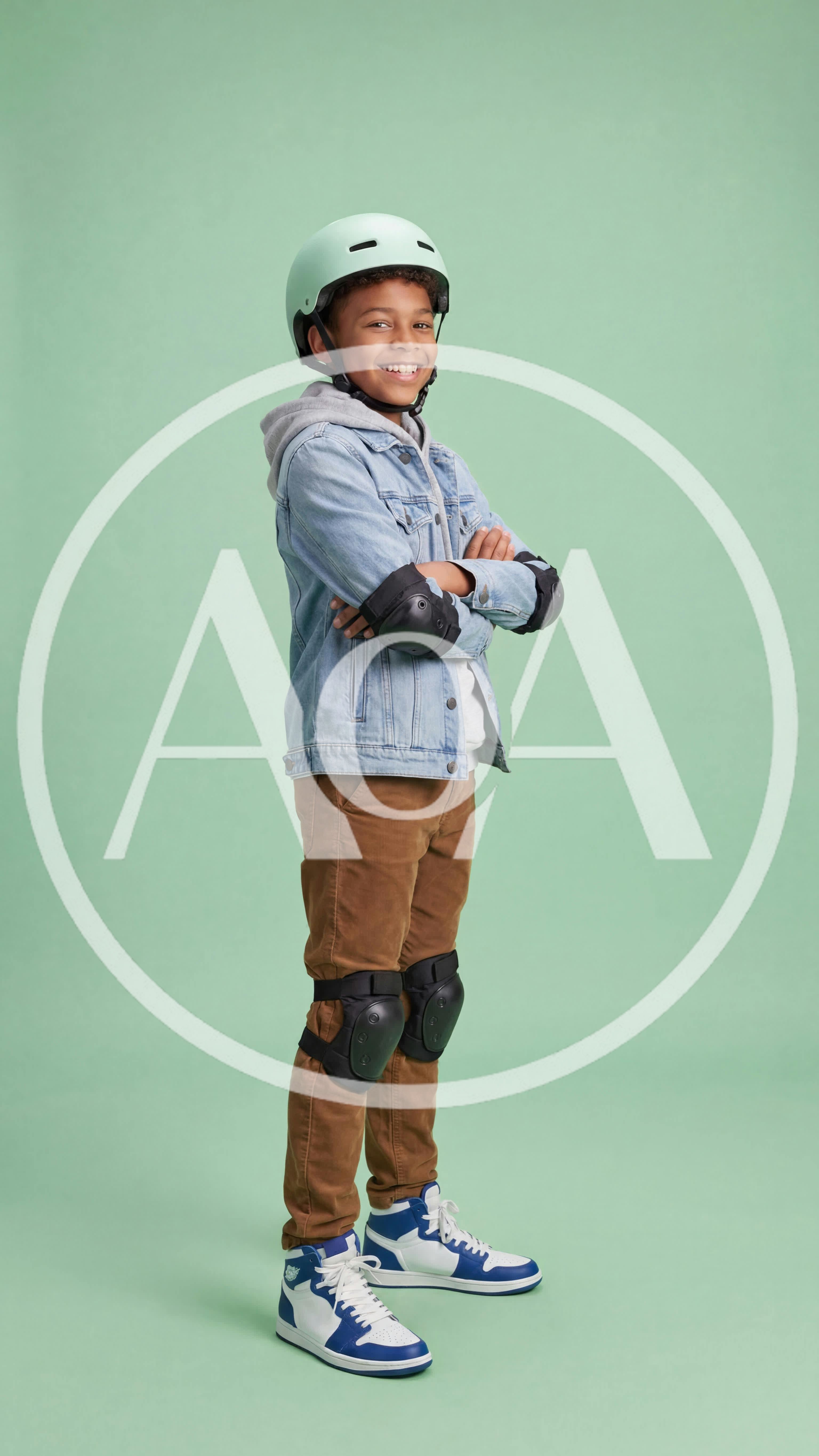 Young Boy Wearing Protective Gear and Helmet