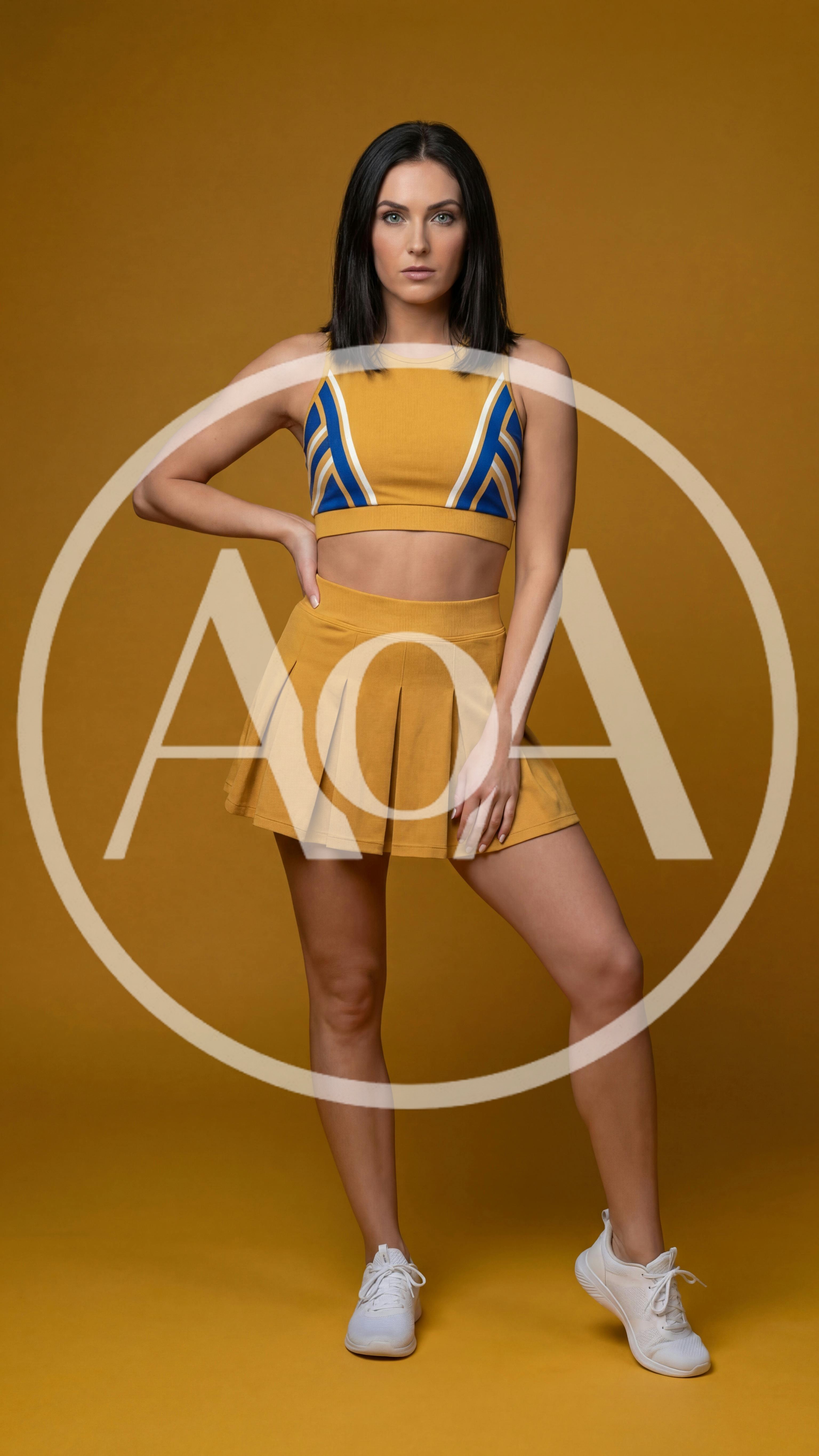 Cheerleader Posing In Yellow Uniform Against Studio Background