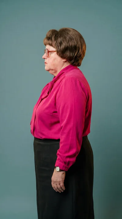 Side Profile Of A Mature Woman In Professional Attire