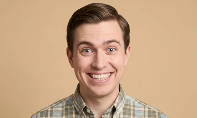 Portrait Of A Smiling Young Man
