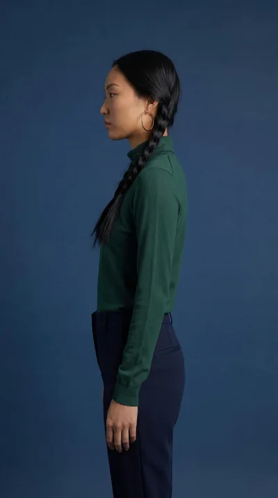 Side Profile Of A Woman In A Green Turtleneck