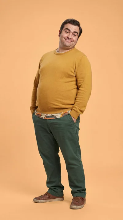 Full Body Portrait Of A Smiling Man In Casual Clothing