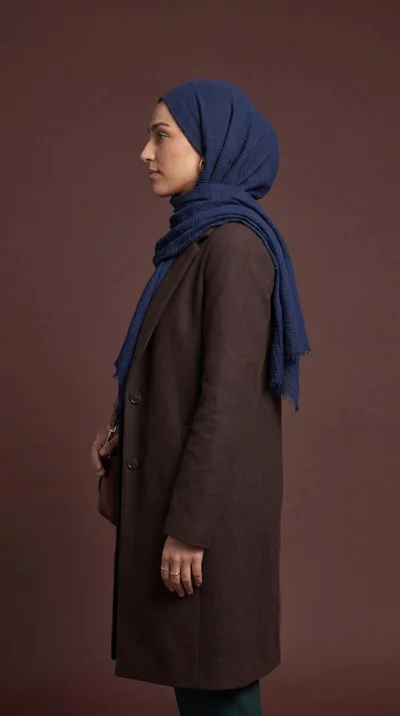 Side Profile Of A Woman Wearing A Hijab