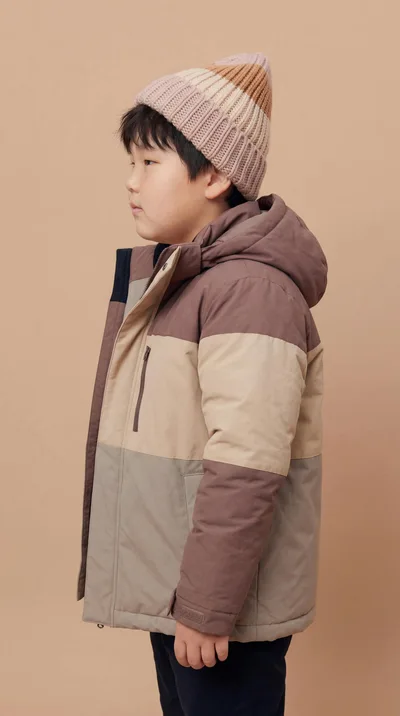 Young Asian Boy Wearing Winter Jacket and Beanie