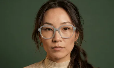 Portrait Of A Woman Wearing Glasses