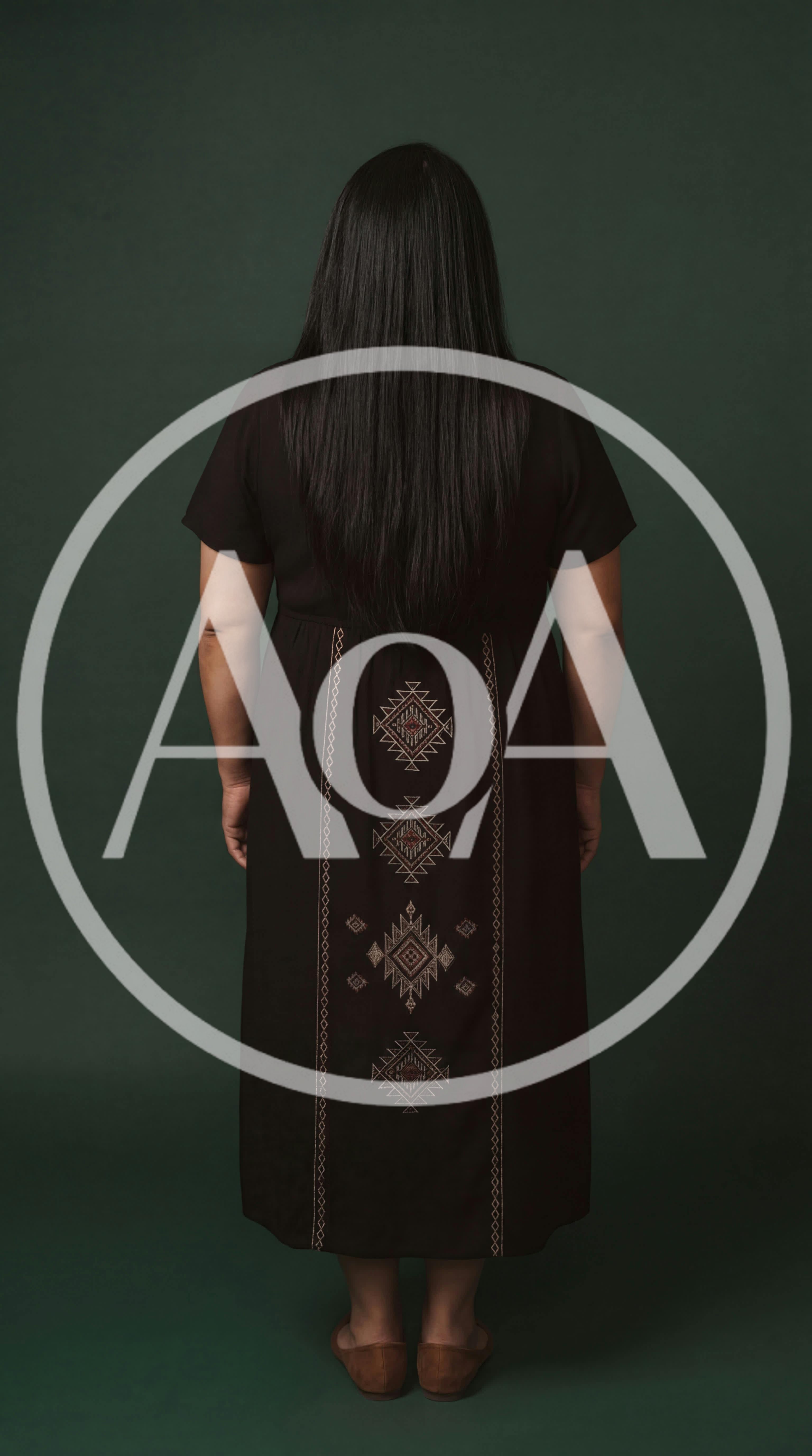 Woman Standing Back View Wearing Embroidered Black Dress