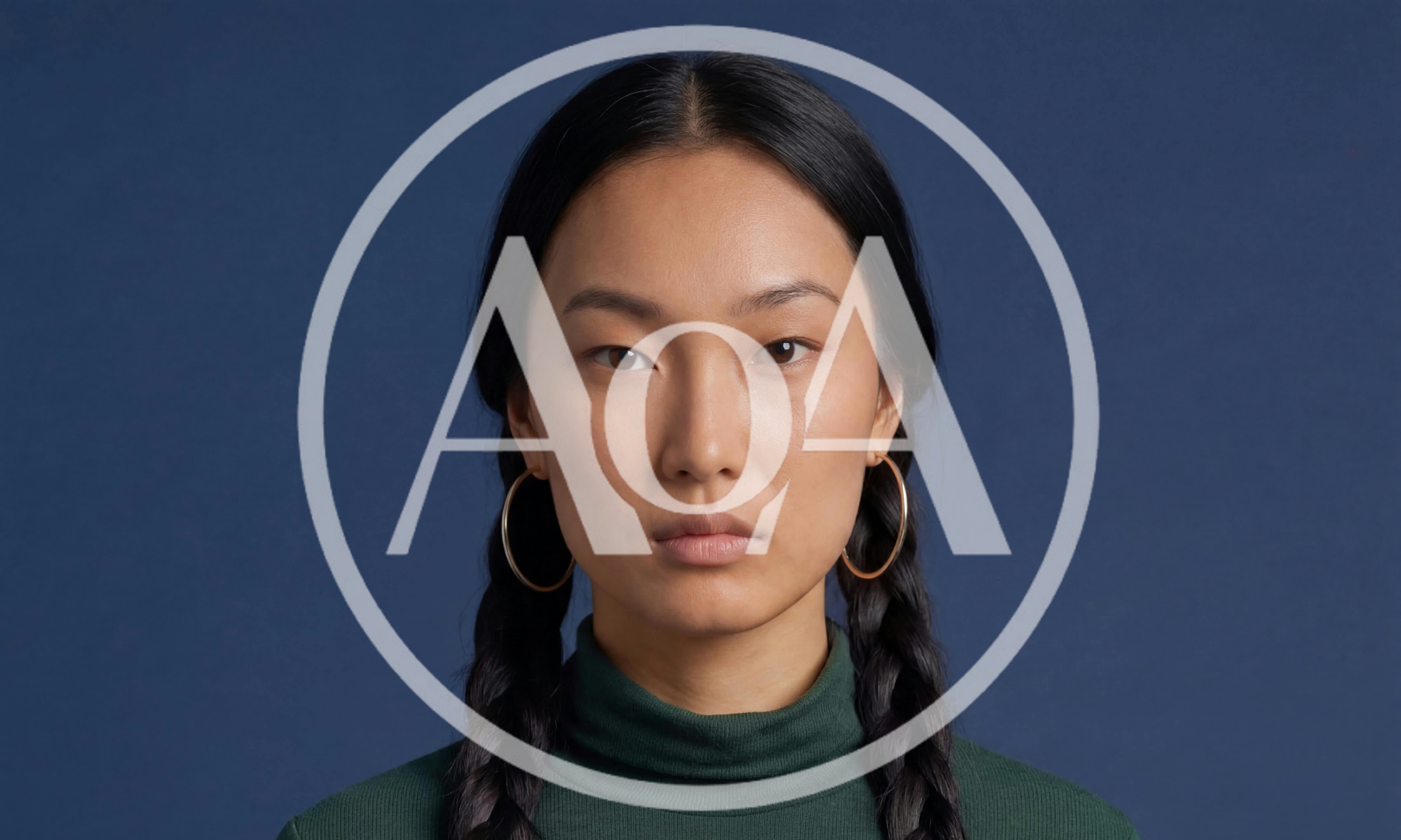Portrait Of A Young Asian Woman With Braided Hair