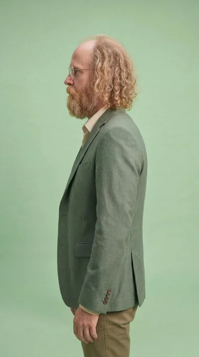 Profile Portrait Of A Middle Aged Man In A Suit