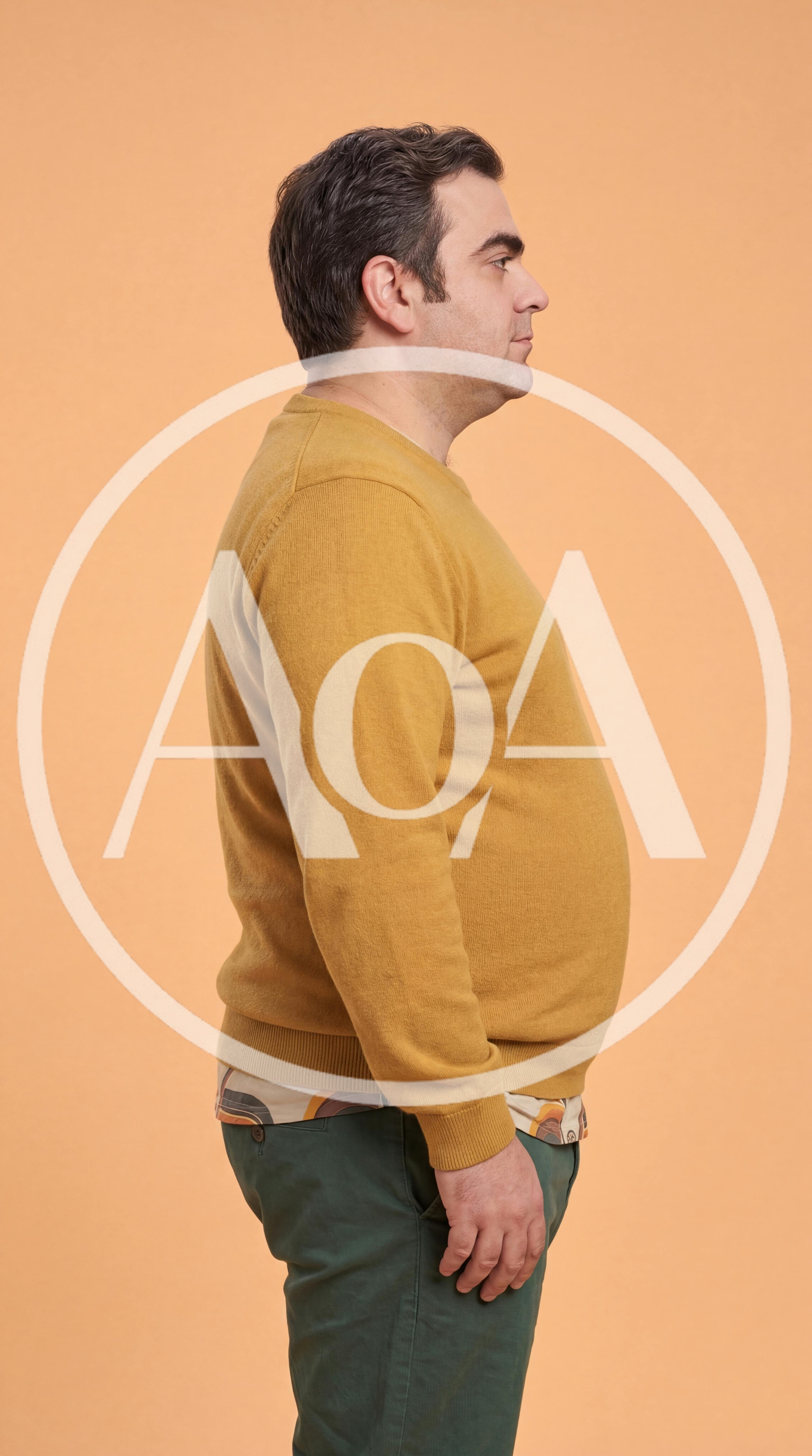Side Profile Of A Man Wearing A Yellow Sweater