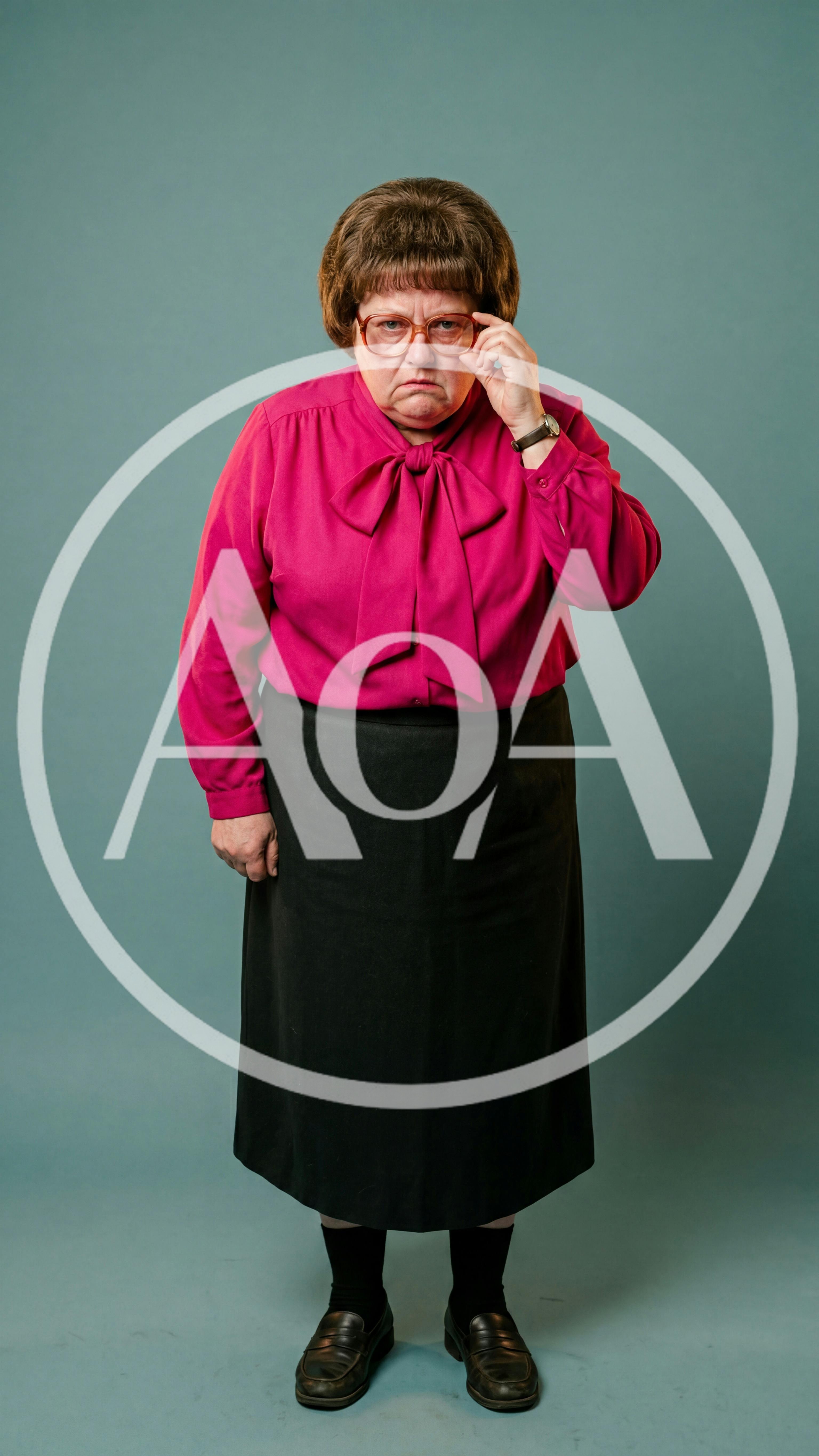 Stern Middle Aged Woman Adjusting Her Glasses