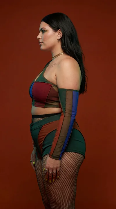 Side Profile Of A Woman In Patchwork Fashion