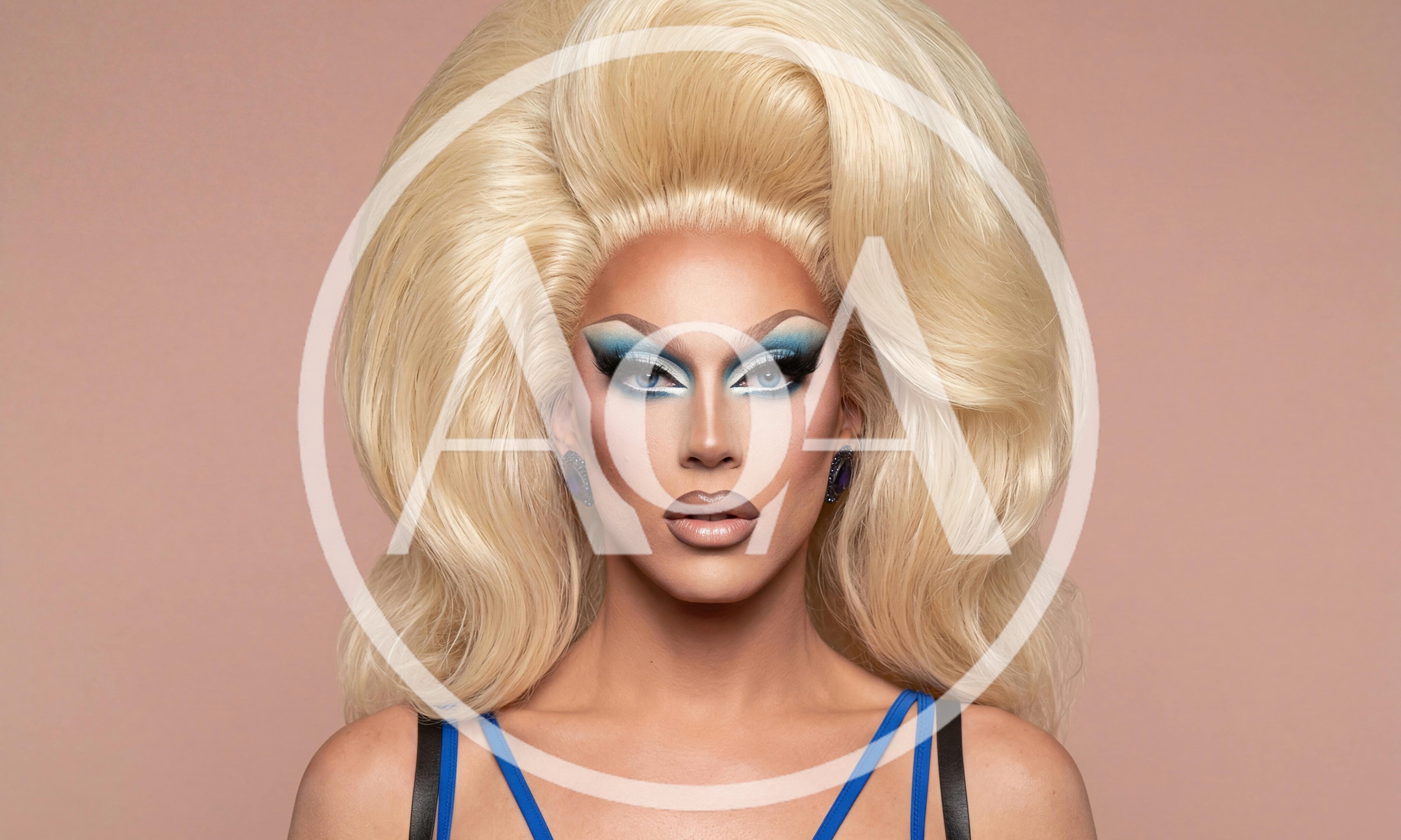 Drag Queen With Blonde Hair And Blue Makeup